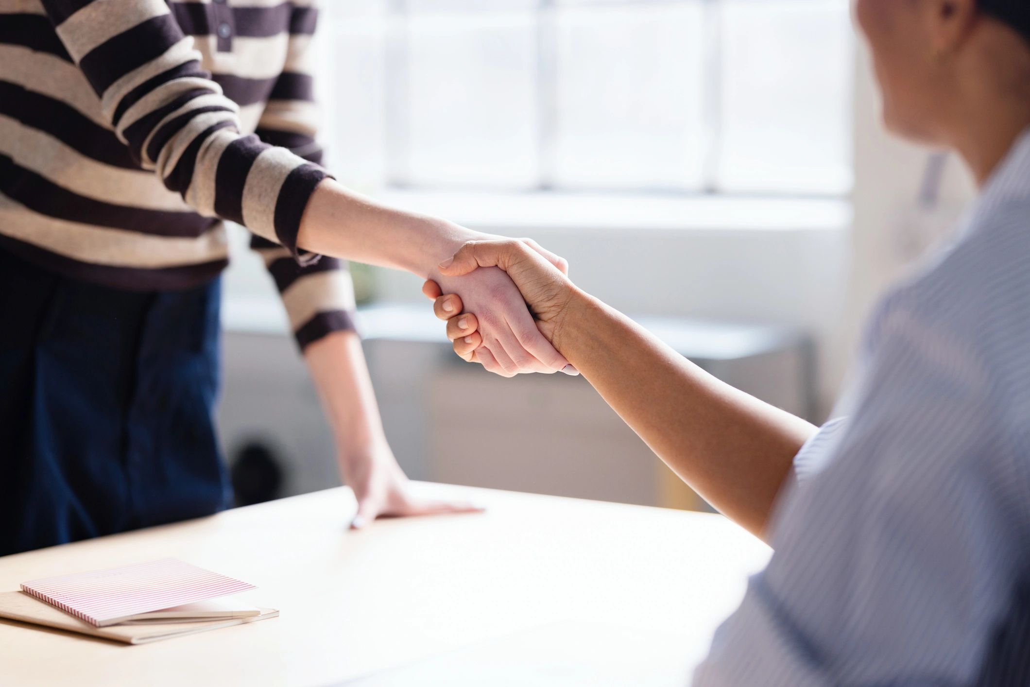 Business handshake symbolizing trusted trade partnership
